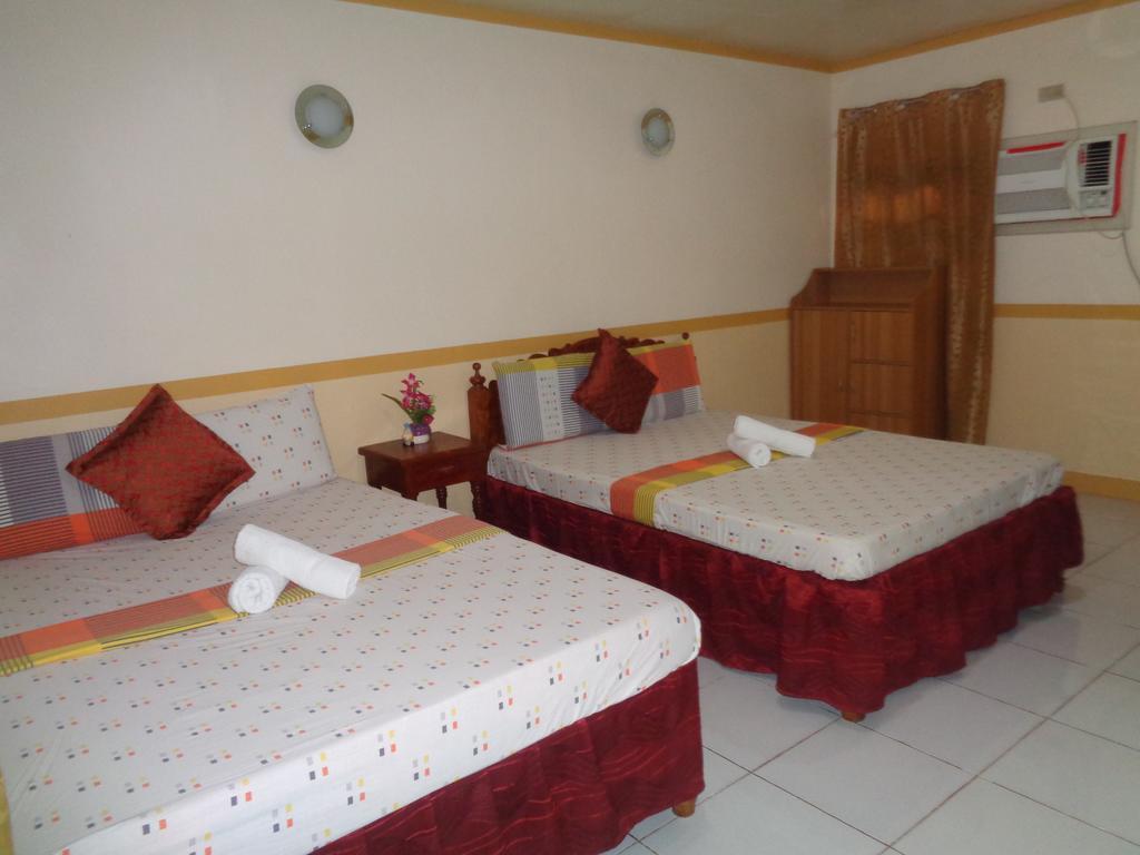 D'Lucky Garden Inn & Suites Tiniguiban Exteriör bild