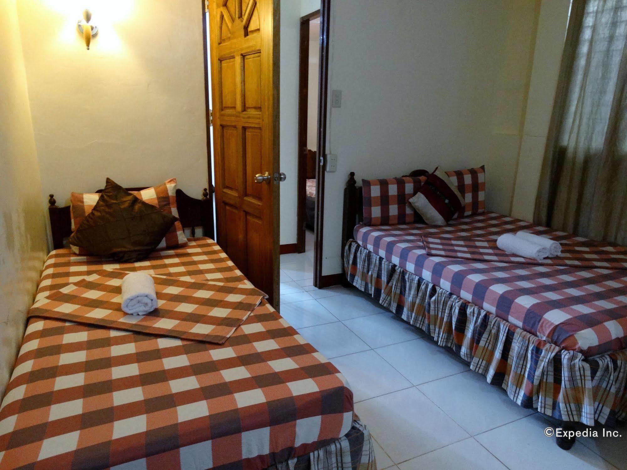 D'Lucky Garden Inn & Suites Tiniguiban Exteriör bild